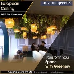 Transform your space with greenery from above. This European-style ceiling is adorned with our artificial creepers and stylish lights, creating a warm and magical ambiance in this restaurant.
