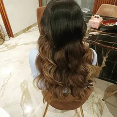 Beautiful ombre hair styled into loose, beachy waves. This shows how I work with colored hair to enhance its dimension and texture.