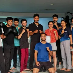 Celebrating the success of our young fighters is a huge part of our academy's culture. Here, Saniya Khan is with her team after winning a gold medal and the Best Boxer award at the Prayagraj district championship.