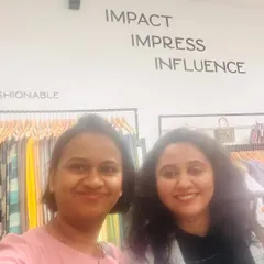 A great moment with a client at my Indyvarna boutique. The words on the wall behind us say it all: Impact, Impress, Influence. That is the goal of my personal branding and image consulting work.