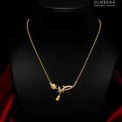 A delicate rose crafted in 22K gold, this necklace is a symbol of timeless love. The design features a blooming rosebud on a gently curved stem, accented with small diamonds for a touch of sparkle.