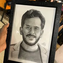 A close-up of the framed pencil sketch I gifted to Aman Gupta.