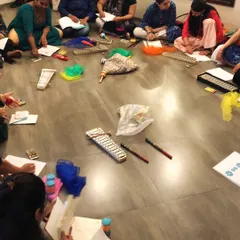 This is what our teacher training looks like: a collaborative, hands-on session where educators learn to design their own play-based music curriculum. Here, our trainees are working together on lesson plans, surrounded by instruments and creative materials.