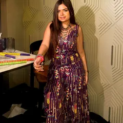 A full-length shot of this gorgeous multi-colored sequin jumpsuit. It's a modern, glamorous alternative to traditional wear for a Navratri party or any festive occasion.