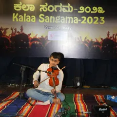 A student finds his voice through the violin, performing soulful Kannada melodies at our annual Kalaa Sangama event. We provide a stage for every student to build confidence and share their passion for music.