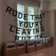 Even the party favors were on-theme. We created custom goodie bags and a banner with the classic farewell line, "Rude that you're leaving but ok," adding another layer of inside jokes for fans of the show.