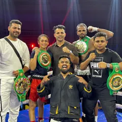 A team of champions. Our fighters and promoters celebrating with their newly won WBC title belts.