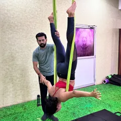 You are always supported here. I provide hands-on guidance, especially for beginners, to ensure you feel safe and confident as you learn to trust the hammock and explore new movements like this supported inversion.
