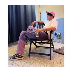 I styled actor Anshuman Malhotra in this trendy streetwear look. The outfit features color blocked purple and pink jeans paired with a simple white t-shirt and a pink cap for a relaxed, modern vibe.