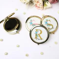 These customized pocket mirrors are stylish, handy, and oh-so-personal. I can add a name and initial with a beautiful floral design, making them perfect for bridesmaid squads or a little self-love treat.