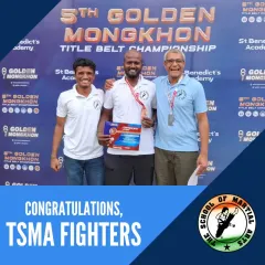 Success is a team effort. Here, our founder Master Ashwin and senior coach Rajith Kumar celebrate with a student after a victory at the Golden Mongkhon Muay Thai Tournament. This reflects our core philosophy of mentorship and shared achievement.
