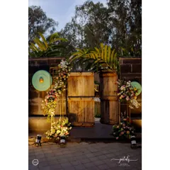 An entrance should be the first chapter of your event's story. I designed this modern broken arch with cascading florals and warm uplighting to create a dramatic and elegant welcome for a sangeet night.
