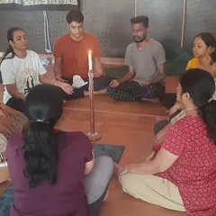 We practice Jyoti Trataka, or candle gazing, a traditional meditation technique. This practice is excellent for improving concentration, calming the mind, and promoting better sleep.