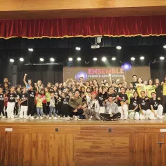 A proud group photo with our talented performers at the end of a showcase. This picture captures the energy, camaraderie, and sense of accomplishment that defines the Ensemble experience.