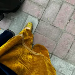 It's all in the details. The traditional jutti perfectly complements the ethnic vibe of this velvet suit.