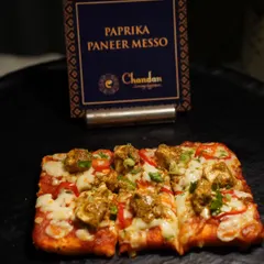 Sip and munch. My Paprika Paneer Messo is a fusion flatbread that's perfect for passing around as an appetizer, offering a cheesy and spicy kick.