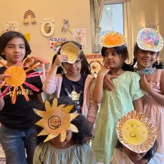 More sunny faces from our sun-themed art class. It's pure joy to see them this happy with what they've made.