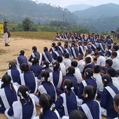 An outdoor session with students in the beautiful valleys of Uttarakhand. These workshops are a form of *nrityasewa* (service through dance), focusing on sharing knowledge rather than just performance.