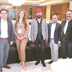 Networking with esteemed colleagues at the conference. The exchange of ideas with other leaders in the industry is one of the most valuable aspects of these events.