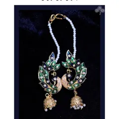 A beautiful peacock design full earcuff with Meenakari work and a delicate pearl chain.