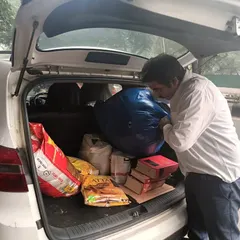 Preparing to distribute essentials to those who need them. It's a small effort to bring some relief and support to my community.