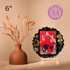 Another 6-inch Guruji frame, this time in a deep black, which makes the photo and the surrounding flowers stand out beautifully.