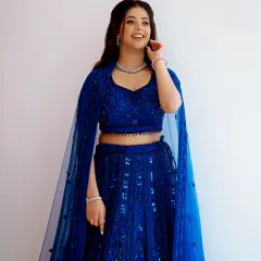For an engagement or reception, a pop of colour can be magical. Here, I created a glamorous look to match this stunning royal blue lehenga. The makeup features softly defined eyes and a glowing complexion, ensuring the bride feels confident and looks radiant throughout her celebration.