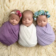 Capturing one newborn is special, but three is a blessing. This photo of triplets, each swaddled comfortably, shows my experience in safely handling and posing multiples for a beautiful, coordinated portrait.