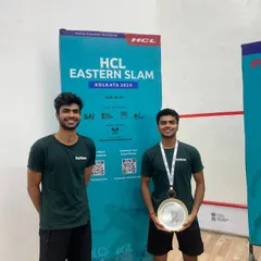 Another shot of our player celebrating his silver medal at the HCL Eastern Slam. This is a testament to the consistent performance of our team.