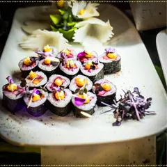 Our chefs prepared a variety of world cuisines for this intimate wedding. These beautiful sushi rolls, garnished with edible flowers, were a highlight of the Asian station.