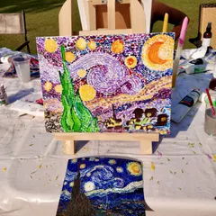 The amazing result! A student proudly displays her version of "Starry Night" next to the reference photo at our outdoor workshop.