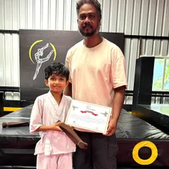 Another one of our dedicated students celebrating his achievement at the Karate Belt Grading Exam. He has shown great discipline and spirit. Well done.