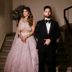 The power of a bespoke tuxedo lies in its fit and presence. Here, the detailed craftsmanship of the jacket is on full display, offering a bold and confident look for any groom or wedding guest.