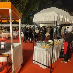Our team managing live food counters at a large outdoor corporate event. We are experienced in handling high-volume catering for annual celebrations and parties.