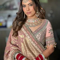 A classic half-up style with soft, flowing waves is one of my most requested looks. It’s timeless, romantic, and perfect for any wedding event, from the engagement to the reception.