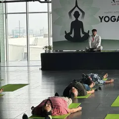 A moment of deep relaxation in Savasana during a corporate event for International Yoga Day. I guide employees through calming sequences that help quiet the mind and restore energy, which is essential for a balanced and productive work environment.