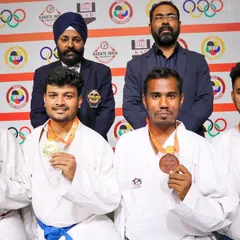 On the podium after winning a bronze medal for Karnataka State at the national championships. I bring this competitive experience to every class I teach.