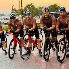 A group of our riders in matching kits, resting before the start of the 60km amateur race.