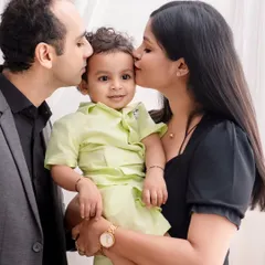 These are the moments that become your most treasured memories. I focus on capturing the quiet, unscripted love between family members, like this tender moment of parents kissing their little boy. It’s a simple, powerful portrait of family connection.
