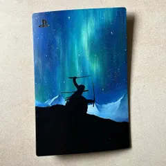 A 'One Piece' themed PS5 plate, featuring Zoro under the Northern Lights. This piece also glows in the dark, which is a super cool effect.