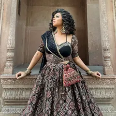 This is for my desi girlies who love a grand entrance. An Ajrakh print lehenga is perfect for a wedding or festive event. I focus on putting together complete looks, from the outfit to the smokey eye makeup and statement jewelry, ensuring you feel like a star.