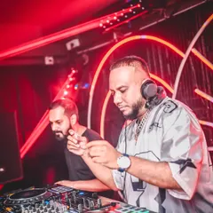 Focused on the mix during a packed hip hop night. I’m not just pressing play, I’m live blending tracks and reading the crowd to keep the energy high.