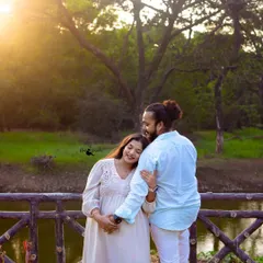 A gentle, candid moment where she rests her head on his shoulder. We focus on capturing these unposed, emotional connections that truly show the love between a couple as they await their baby.