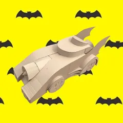 I can create kits based on any character or theme your child loves. This unpainted cardboard Batmobile is an example of a custom build, ready for a young superhero to assemble and decorate at their own creative workshop.