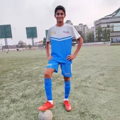 Rio Pane standing proudly on the pitch. His move to a professional I-League club's youth team is a significant milestone that we celebrate as a success story for our development pathway.