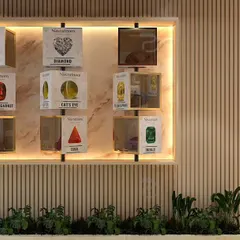 This conceptual design showcases an interactive display wall for various gemstones. The modular, back-lit boxes and integrated greenery create a modern, museum-like feel that encourages customer engagement.