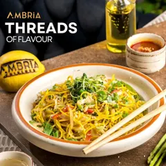 A comforting bowl of "Threads of Flavour" noodles, stir-fried with fresh vegetables and microgreens. A simple yet satisfying dish from our Pan-Asian selection.