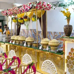 A closer look at our catering counter setup. We arrange everything neatly, from the food warmers to the water dispensers, ensuring a smooth dining experience for your event.