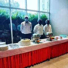 Our team ready to serve at a birthday party. We bring the same level of professionalism and care to every event, no matter the size.