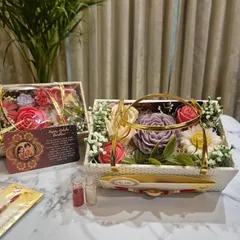 This Flower Bouquet Gift Hamper for Rakhi comes with a custom photo card, making it an incredibly personal gift. You can choose the fragrances and add your own message to create a cherished memory.